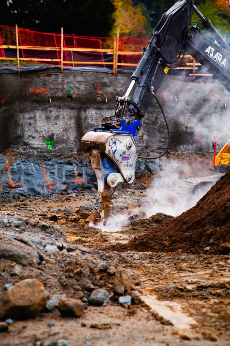 Xcentric Ripper On Backhoe Dredge Xcentric Ripper vs. Hydraulic Hammer: Which Attachment Performs Best in ...