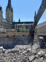 Hydraulic Hammer working in rock in front of the Canadian Parliment